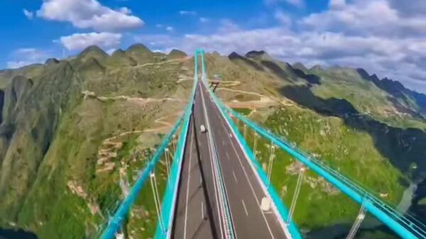 #viral| ከምድር 625 ሜትር ከፍታ፤ ከዓለም ረዥሙ ድልድይ በጉዥኦ መንደር ተከፈተ - Sputnik አፍሪካ