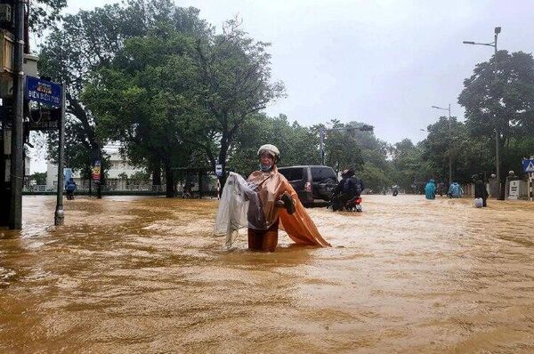 #viral | በቬትናም 14 ሰዎችን ለሞት የዳረገ የጎርፍ አደጋ በርካታ ግዛቶችን አጥለቅልቋል - Sputnik አፍሪካ