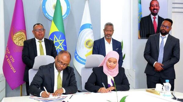 የገቢዎች ሚኒስቴር እና የኢትዮጵያ ንግድ ባንክ የግብር አሰባሰብን ለማዘመን ተስማሙ - Sputnik አፍሪካ